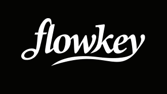 Pianoles met Flowkey logo
